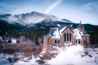 A winter scene of an historic 100 year old chapel after a snowstorm