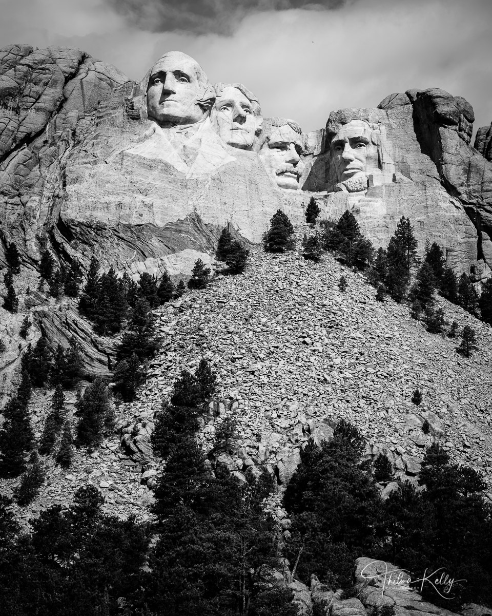 Mt. Rushmore National Memorial features four U.S. presidents carved into the granite mountain side