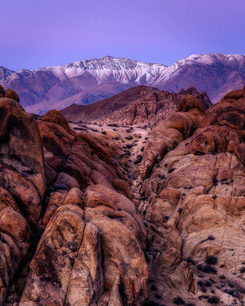 The Rockiest Road The rounded, oddly shaped contours of the Alabama Hills form a sharp contrast to the glacially carved ridges of the Sierra Nevada...