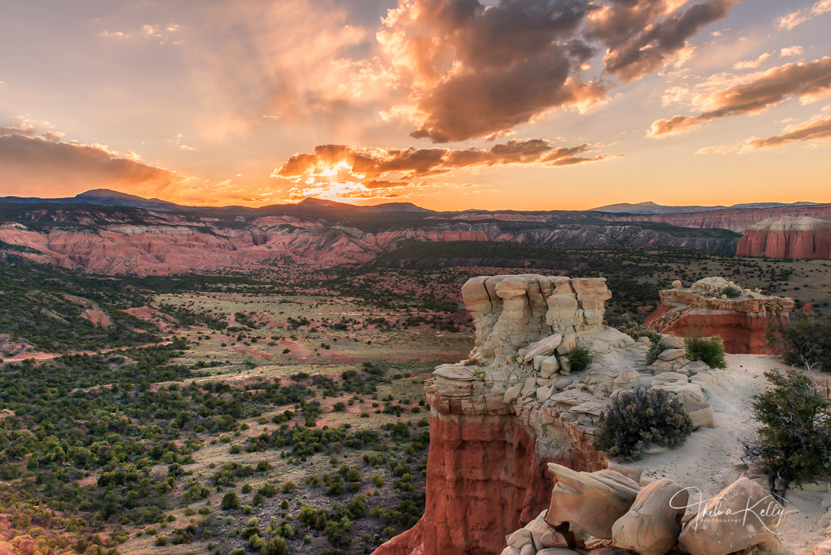 Valley God Rays Sunlight streaming through the clouds create god rays in this valley at Capitol Reef National Park, Utah